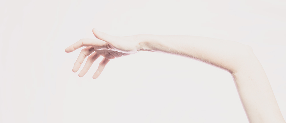 A fair skinned arm on a white background