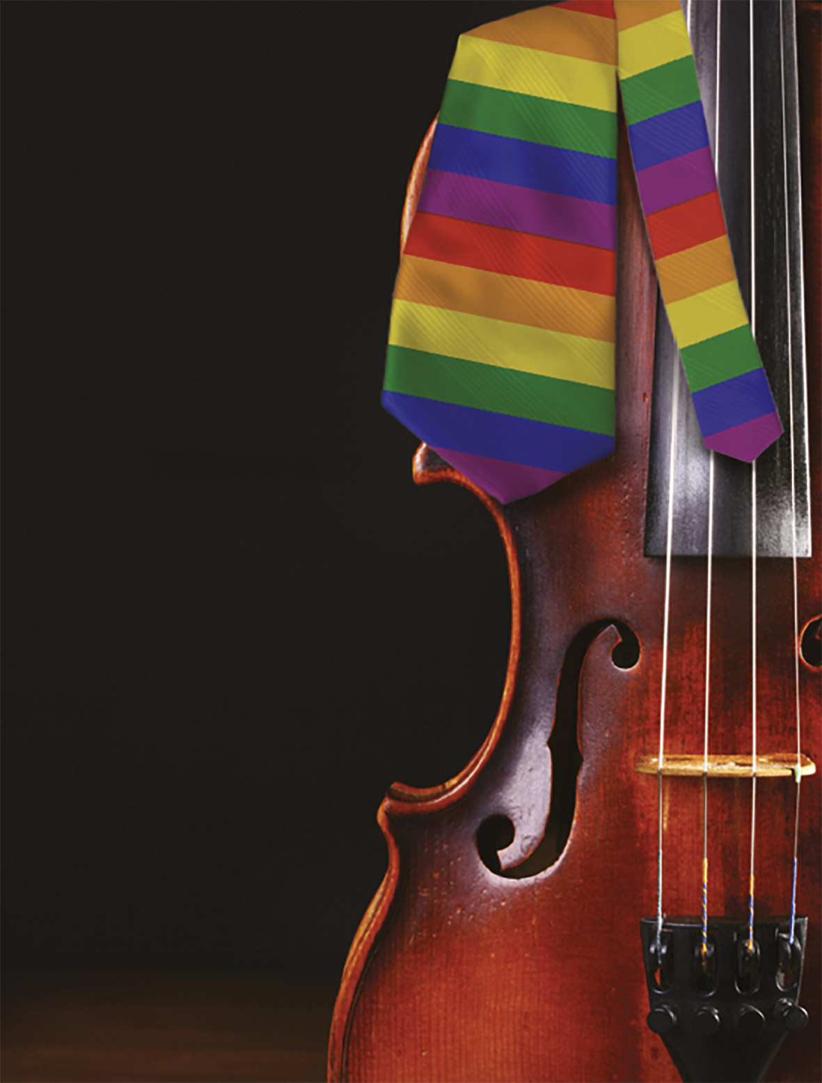 A violin with a rainbow tie over it