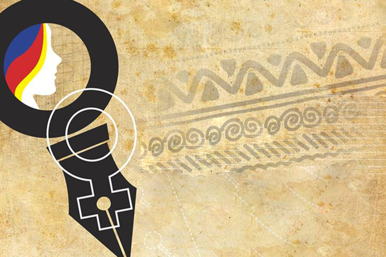 The nib of a female pen on an indigenous cultural design
